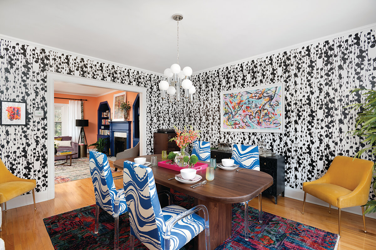 Bold wallpapered Baltimore-style interior with layered colors and patterns